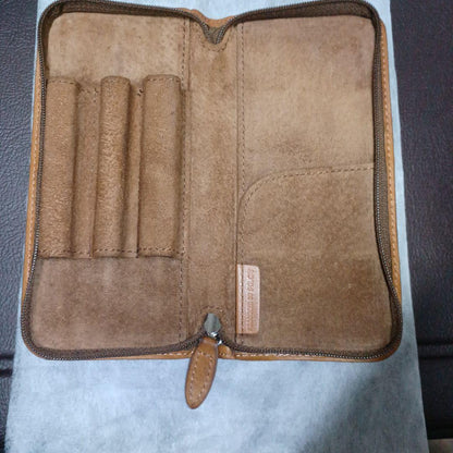 Brown leather Pentsamble Round Zip pen case with zip closure and long wallet design