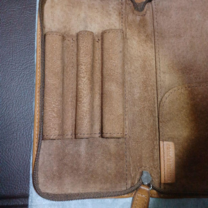 Brown leather Pentsamble Round Zip pen case with zip closure and long wallet design