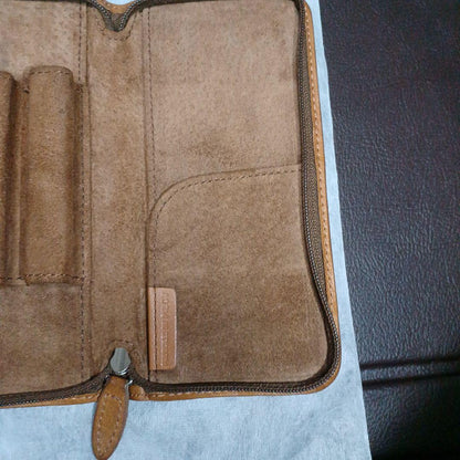 Brown leather Pentsamble Round Zip pen case with zip closure and long wallet design