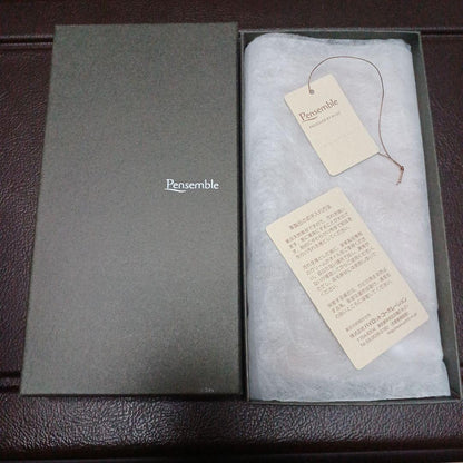 Brown leather Pentsamble Round Zip pen case with zip closure and long wallet design