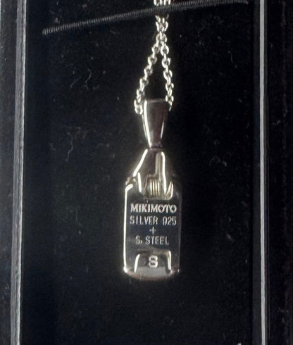 MIKIMOTO Silver 925 necklace with plate-type pendant and included chain on white background