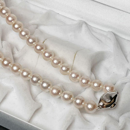 Akoya pearl necklace with white pearls sized 8.0 to 8.5mm on a 41cm strand with silver clasp