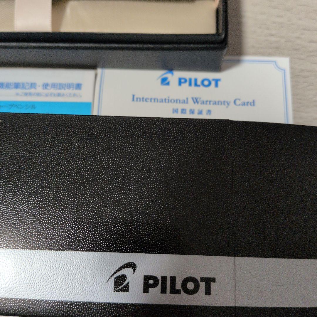 Pilot RiDGE multi-function pen with black and blue ink, sleek black body, shown on white background