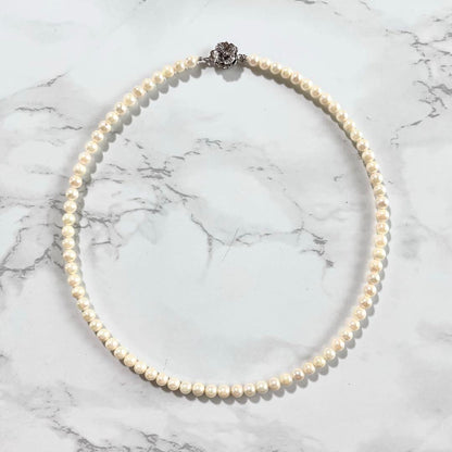 Akoya genuine baby pearl necklace with 5 mm white round pearls on 43 cm silver chain with clasp