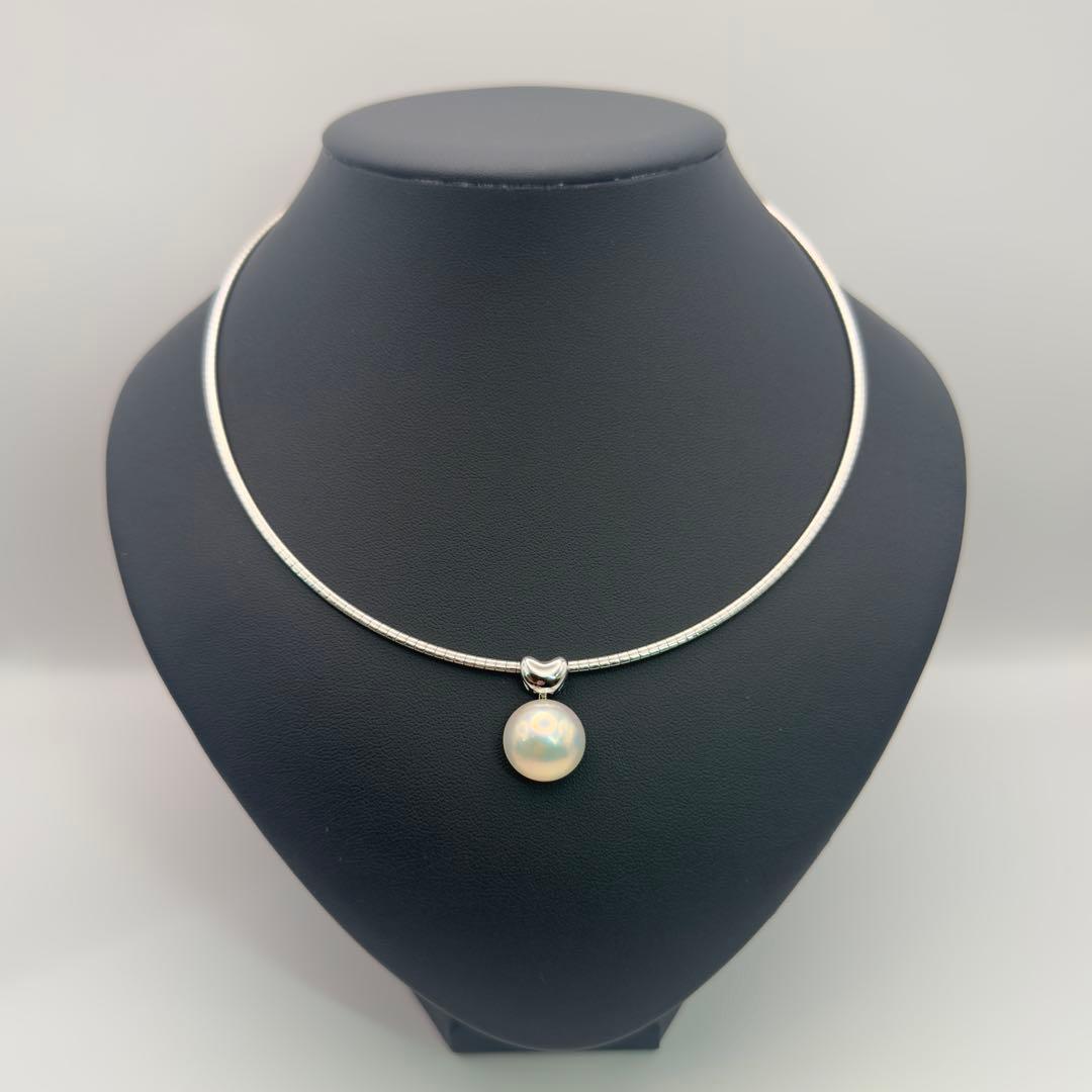 Tasaki sv necklace with a 14.9mm marbled pearl pendant weighing 12.2g