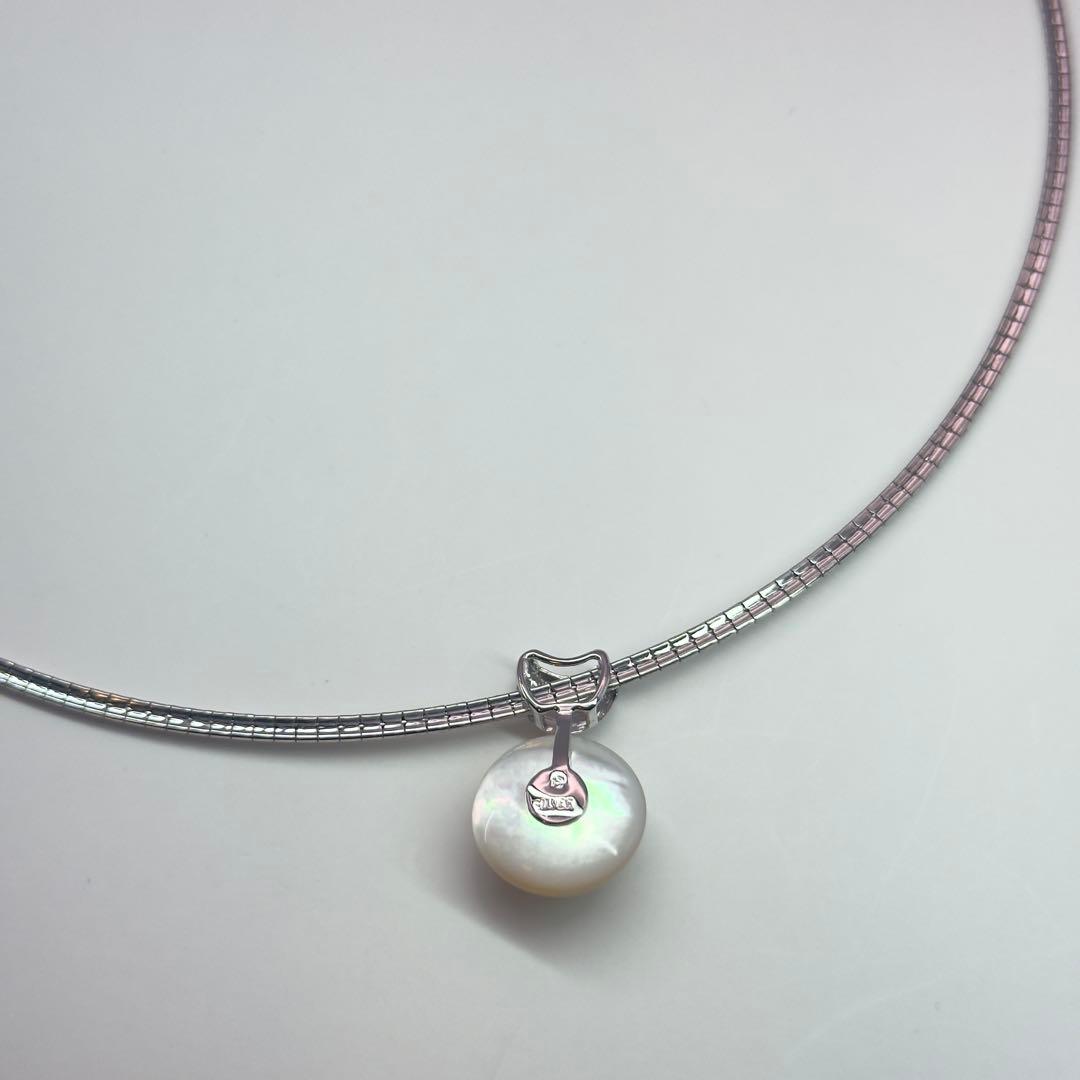 Tasaki sv necklace with a 14.9mm marbled pearl pendant weighing 12.2g