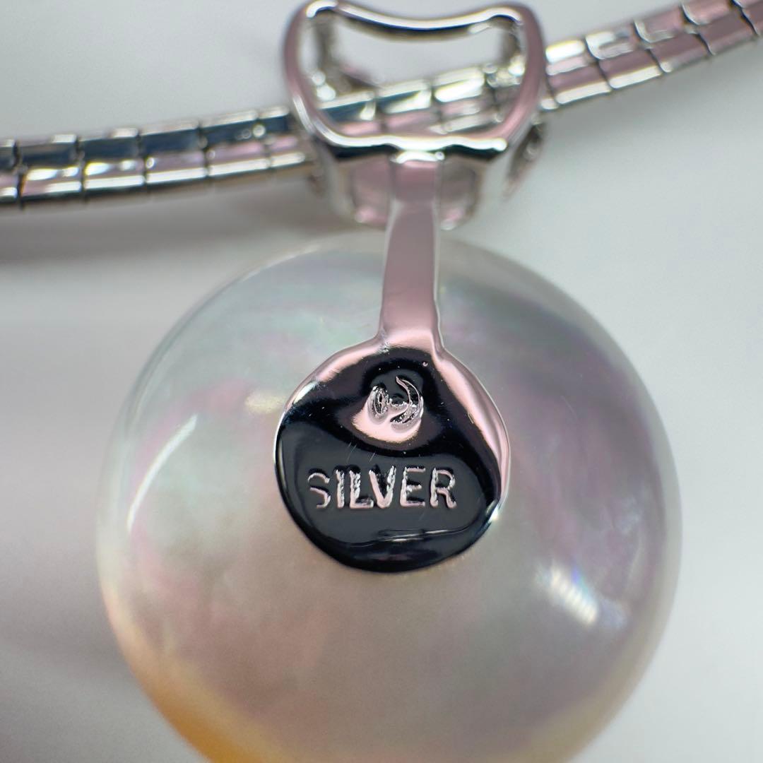 Tasaki sv necklace with a 14.9mm marbled pearl pendant weighing 12.2g