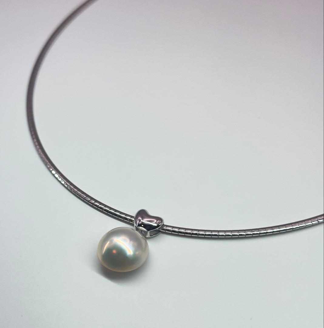 Tasaki sv necklace with a 14.9mm marbled pearl pendant weighing 12.2g
