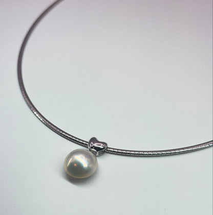 Tasaki sv necklace with a 14.9mm marbled pearl pendant weighing 12.2g
