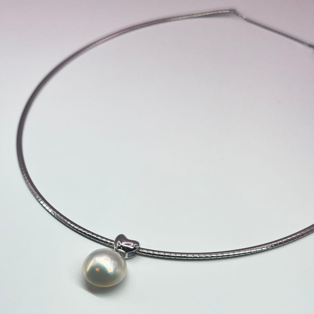 Tasaki sv necklace with a 14.9mm marbled pearl pendant weighing 12.2g