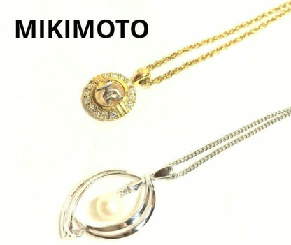 Set of four including Mikimoto silver pearl necklace, Nina Ricci necklace, Nina Ricci handkerchief, and cosmetic item
