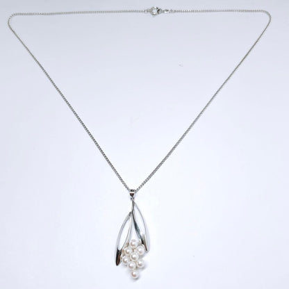 Mikimoto pearl necklace with silver leaf design featuring 3.9 to 4.1 mm pearls and 43.5 cm length