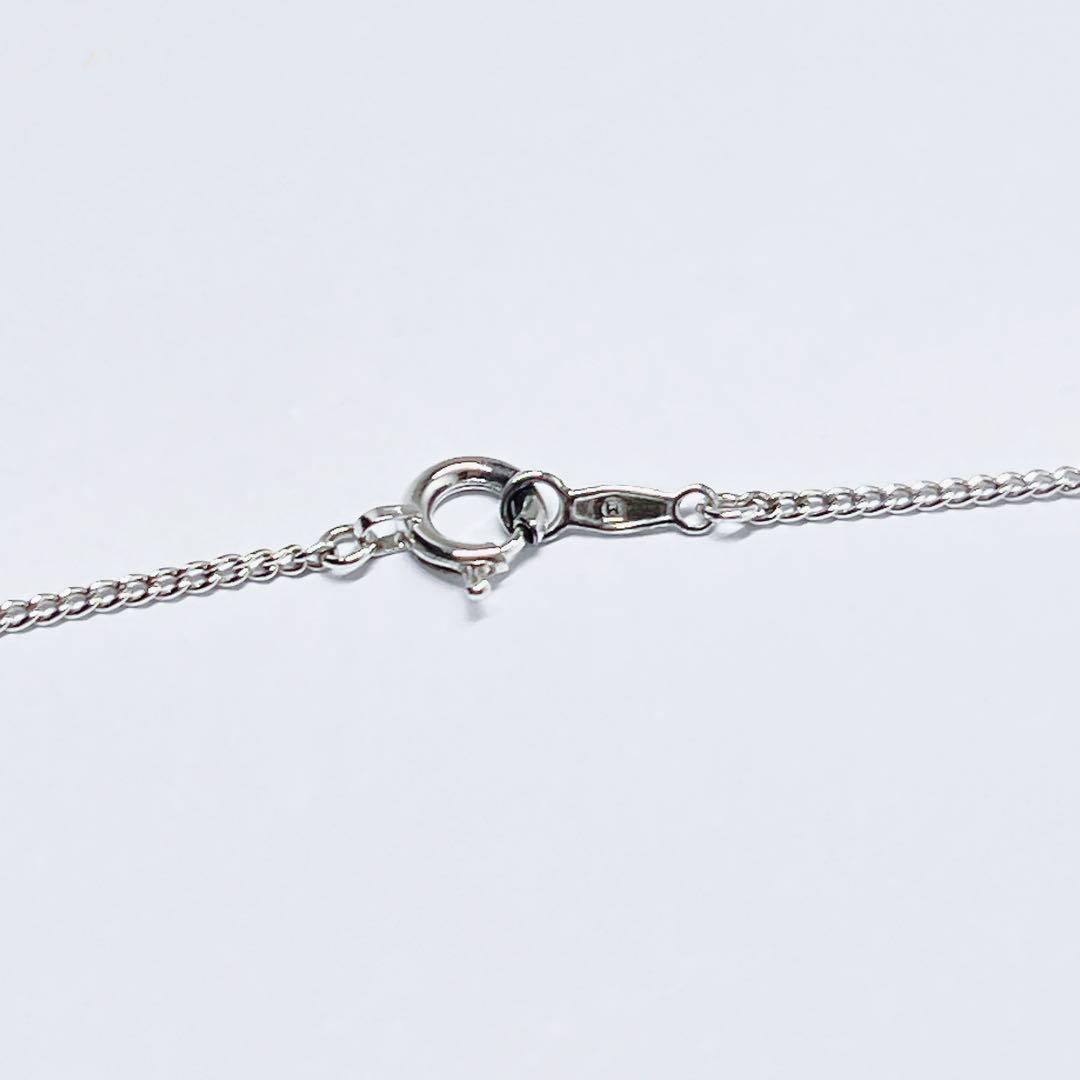 Mikimoto pearl necklace with silver leaf design featuring 3.9 to 4.1 mm pearls and 43.5 cm length