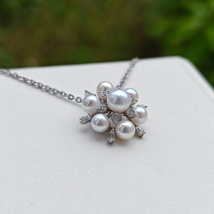 Akoya Pearl Baby Pearl Flower Pendant with 5.5mm and 4.5mm pearls set in silver 20mm earring