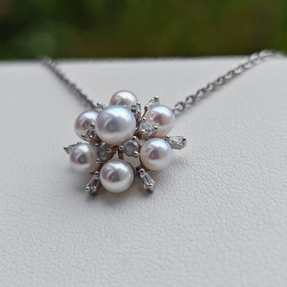Akoya Pearl Baby Pearl Flower Pendant with 5.5mm and 4.5mm pearls set in silver 20mm earring