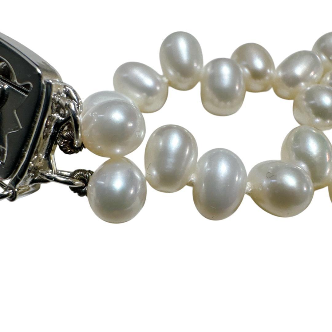 Mikimoto 925 silver necklace and bracelet set featuring freshwater pearls with 40 cm necklace and 17 cm bracelet