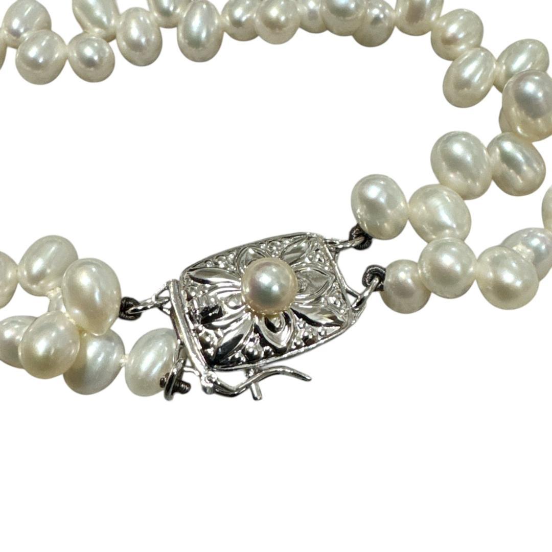 Mikimoto 925 silver necklace and bracelet set featuring freshwater pearls with 40 cm necklace and 17 cm bracelet