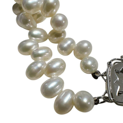 Mikimoto 925 silver necklace and bracelet set featuring freshwater pearls with 40 cm necklace and 17 cm bracelet