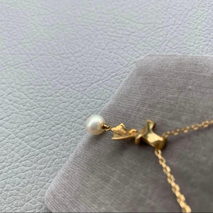 Mikimoto K18 gold pearl necklace with matching pearl pendant approximately 40cm long