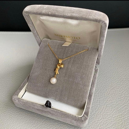 Mikimoto K18 gold pearl necklace with matching pearl pendant approximately 40cm long