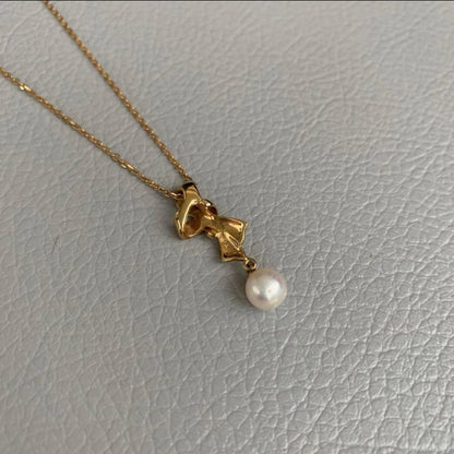 Mikimoto K18 gold pearl necklace with matching pearl pendant approximately 40cm long