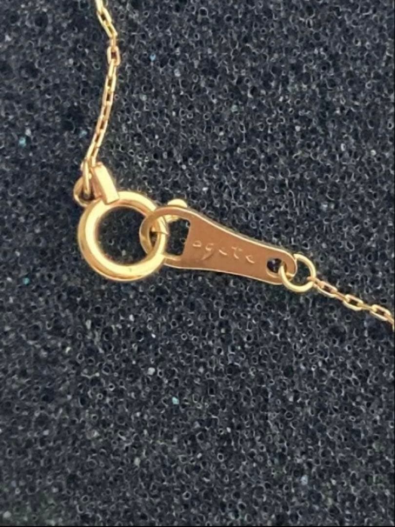 Agate K18 gold necklace featuring a single 0.05 ct diamond on a delicate chain