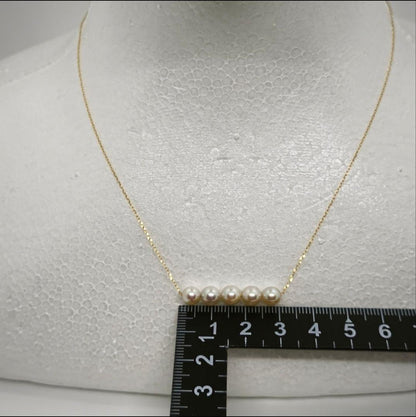 Law K18 18 karat yellow gold necklace with round Akoya pearls, 40 cm length, brand new