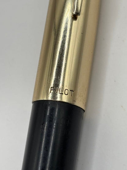 PILOT 14K fountain pen with black body and gold cap featuring an inset nib and 14k engraving