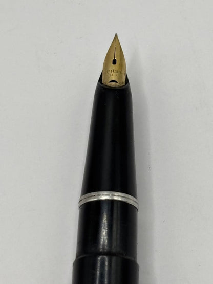 PILOT 14K fountain pen with black body and gold cap featuring an inset nib and 14k engraving