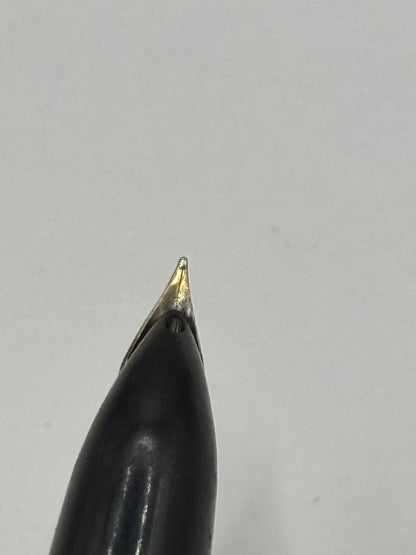 PILOT 14K fountain pen with black body and gold cap featuring an inset nib and 14k engraving