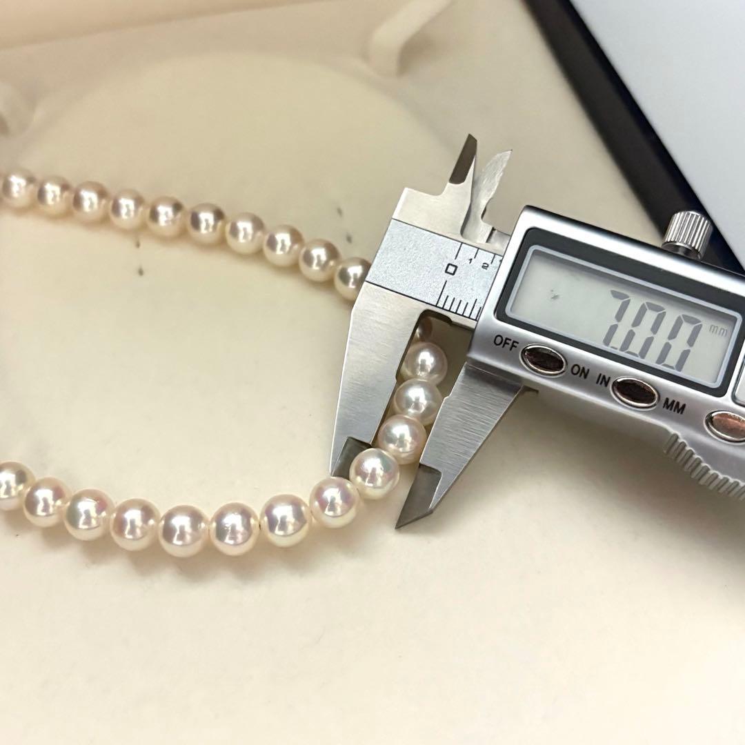 Akoya pearl necklace featuring 7.0mm round white pearls with aurora interference color on a 43cm strand