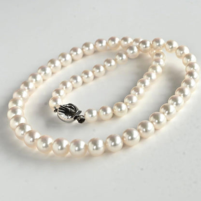 Takashi Akoya pearl necklace featuring 8.8mm round white pearls with WGK14 clasp on 45.5 cm chain
