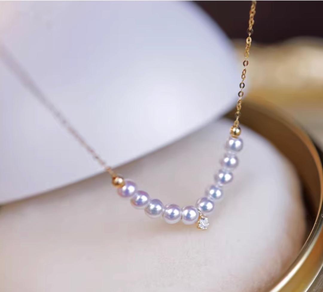 K18YG Akoya pearl necklace pendant featuring an 18K gold smile design with 40+5 cm length