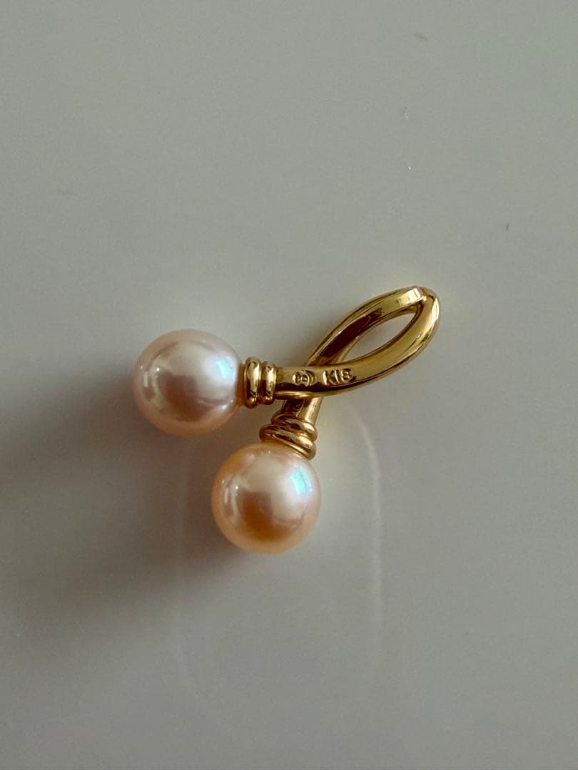 Tasaki Pearl K18 pendant top charm featuring 6mm pearl set in 18K yellow gold weighing around 2 grams