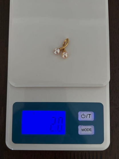 Tasaki Pearl K18 pendant top charm featuring 6mm pearl set in 18K yellow gold weighing around 2 grams