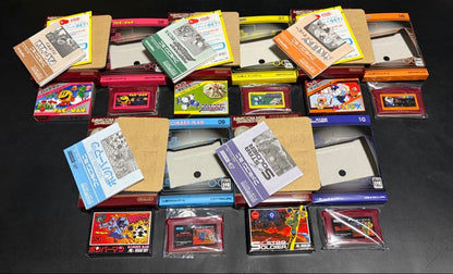 GBA Famicom Mini First Series 10 Items Set showing main boxes and original packaging with instructions
