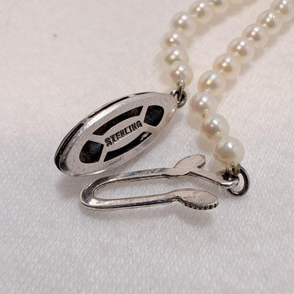 Akoya baby pearl necklace with 3.0 to 7.8mm gradient pearls on a 45.5cm sterling silver chain