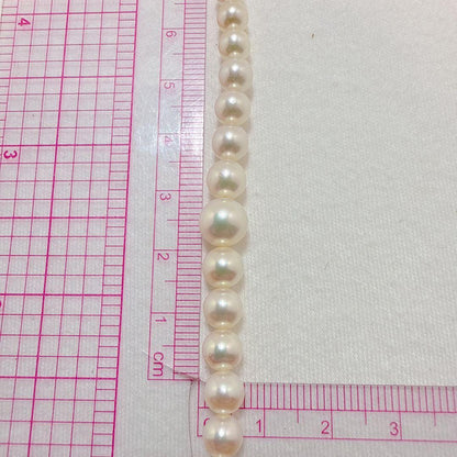 Akoya baby pearl necklace with 3.0 to 7.8mm gradient pearls on a 45.5cm sterling silver chain