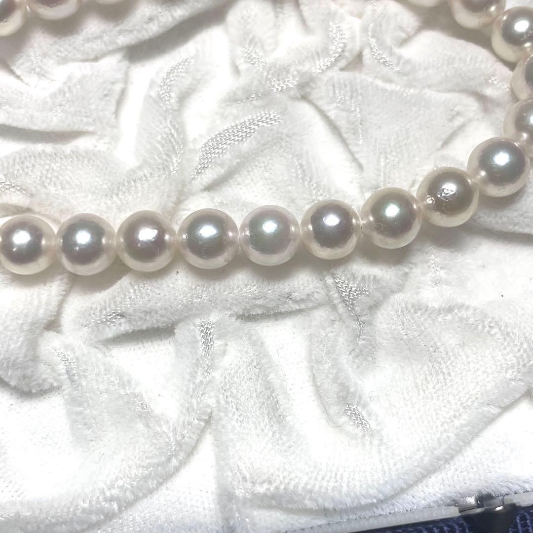 Akoya pearl necklace featuring 7.0-7.4mm pearls and 50cm length displayed on white background