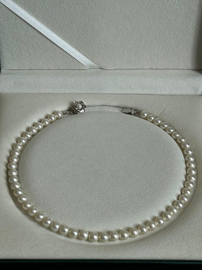 Akoya Hanadama grade necklace and earrings set featuring 7mm white pearl beads with 38cm necklace