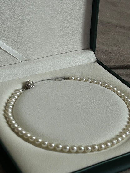 Akoya Hanadama grade necklace and earrings set featuring 7mm white pearl beads with 38cm necklace
