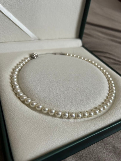 Akoya Hanadama grade necklace and earrings set featuring 7mm white pearl beads with 38cm necklace