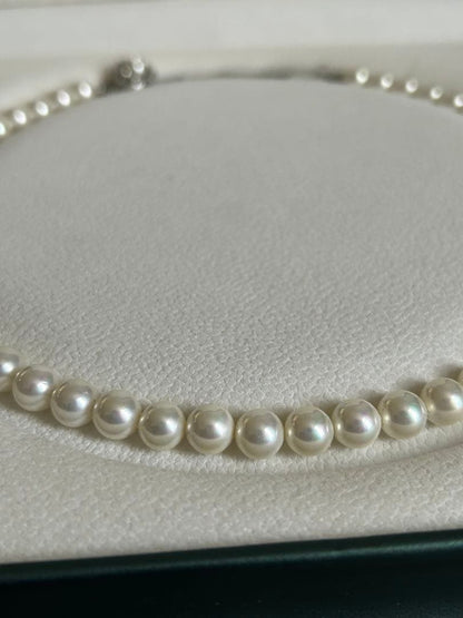 Akoya Hanadama grade necklace and earrings set featuring 7mm white pearl beads with 38cm necklace