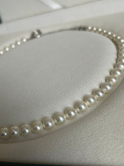 Akoya Hanadama grade necklace and earrings set featuring 7mm white pearl beads with 38cm necklace