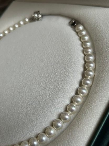 Akoya Hanadama grade necklace and earrings set featuring 7mm white pearl beads with 38cm necklace