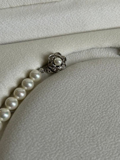 Akoya Hanadama grade necklace and earrings set featuring 7mm white pearl beads with 38cm necklace