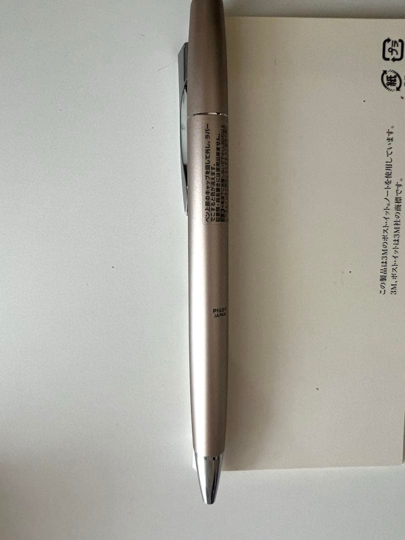 Pilot FriXion Ball Knock Biz pen in champagne gold with black 0.5mm tip and clickable design