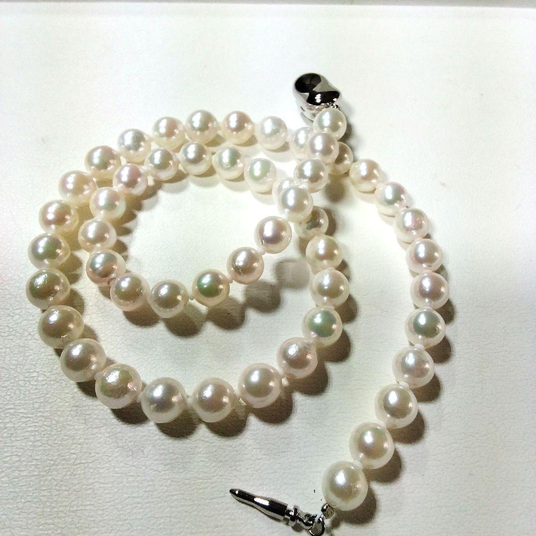 Elegant Akoya pearl necklace featuring 7.0-7.5mm pearls with certificate of authenticity and appraisal