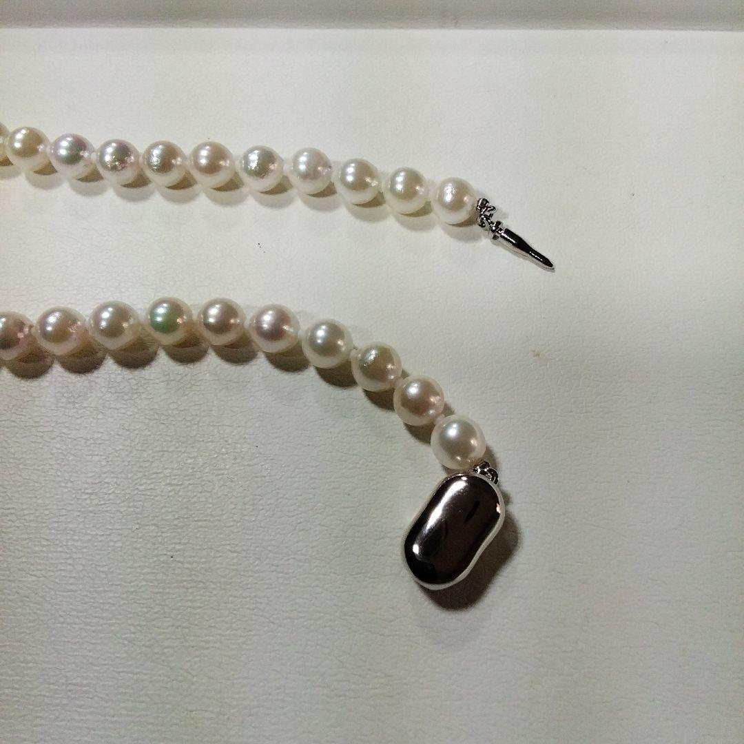 Elegant Akoya pearl necklace featuring 7.0-7.5mm pearls with certificate of authenticity and appraisal