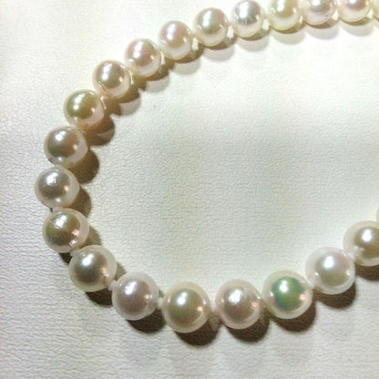 Elegant Akoya pearl necklace featuring 7.0-7.5mm pearls with certificate of authenticity and appraisal